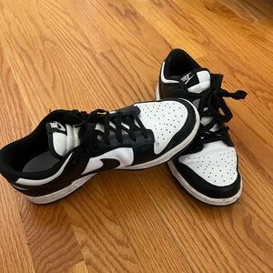 Women’s Nike Dunks low rise black and white Panda sneakers